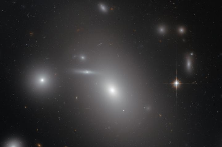 galaxy NGC 4889 deeply embedded within the Coma galaxy cluster