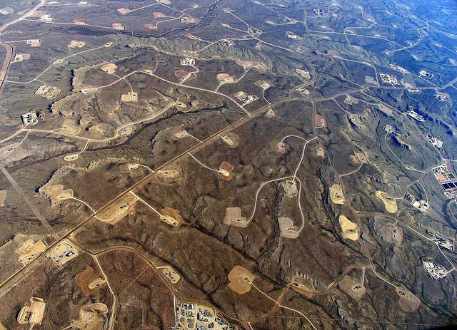 In areas where shale-drilling/hydraulic fracturing is heavy, a dense web of roads, pipelines and well pads turn continuous forests and grasslands into fragmented islands.