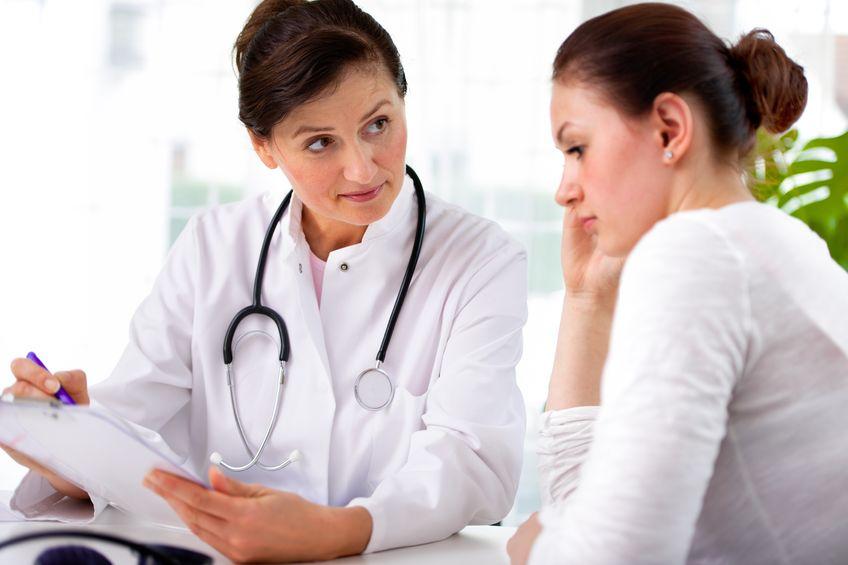 Doctor provides medical advice to female patient