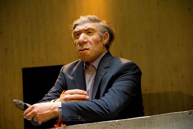 Neanderthal wearing a business suit