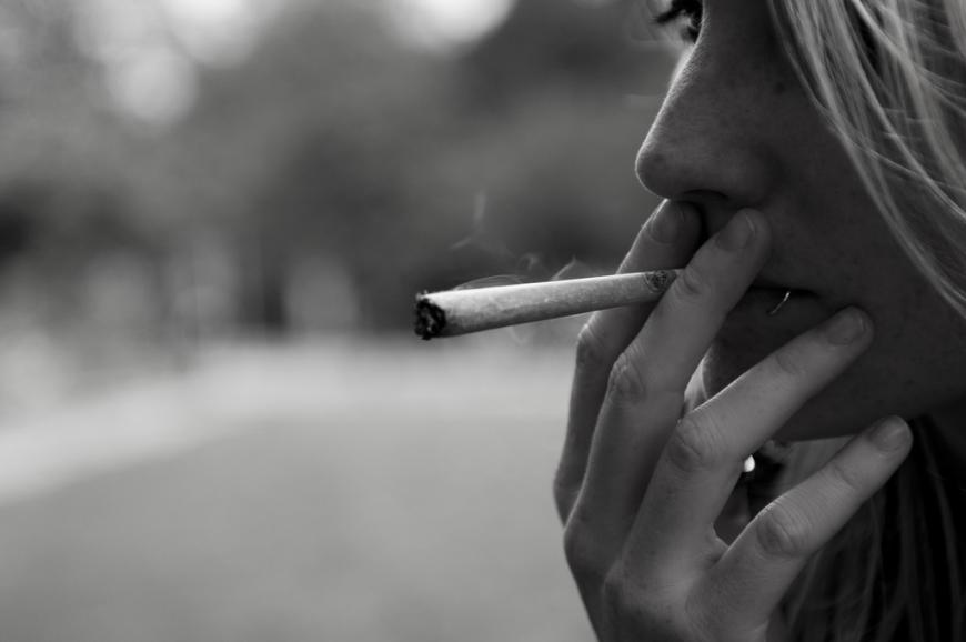 Smoking a joint of marijuana
