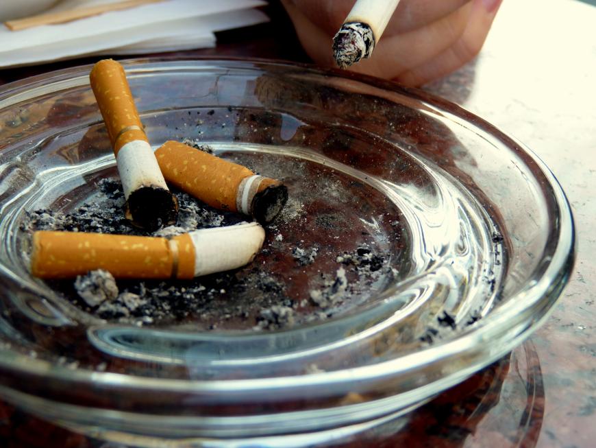 Cigarettes in an ashtray. Tobacco.