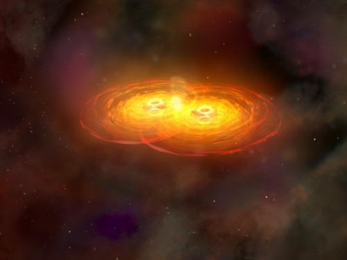 artist&#039;s impression of two merging black holes