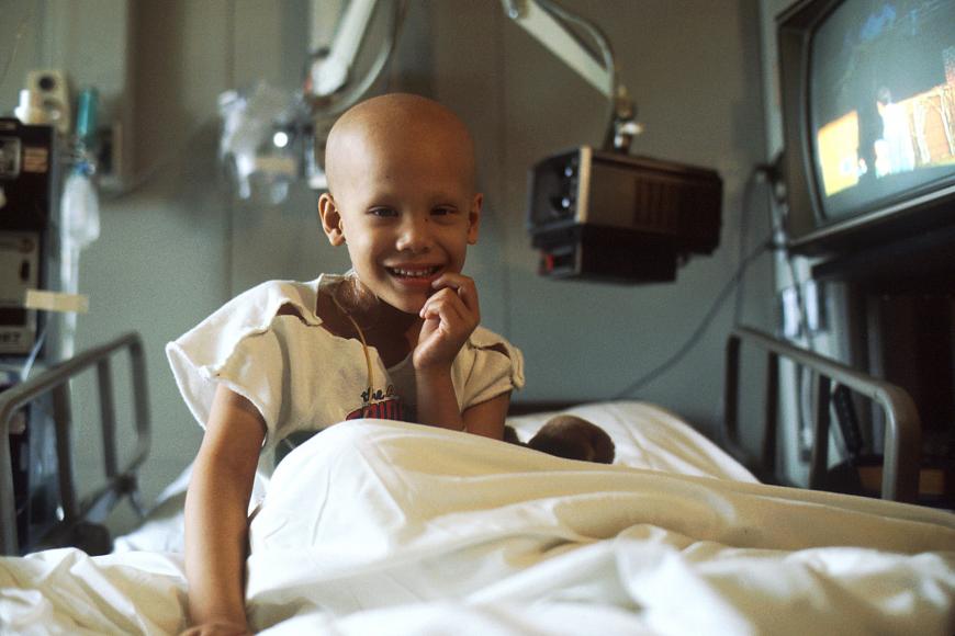 Young girl receiving chemotherapy