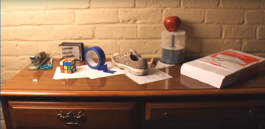 A desk with seemingly innocuous objects on top