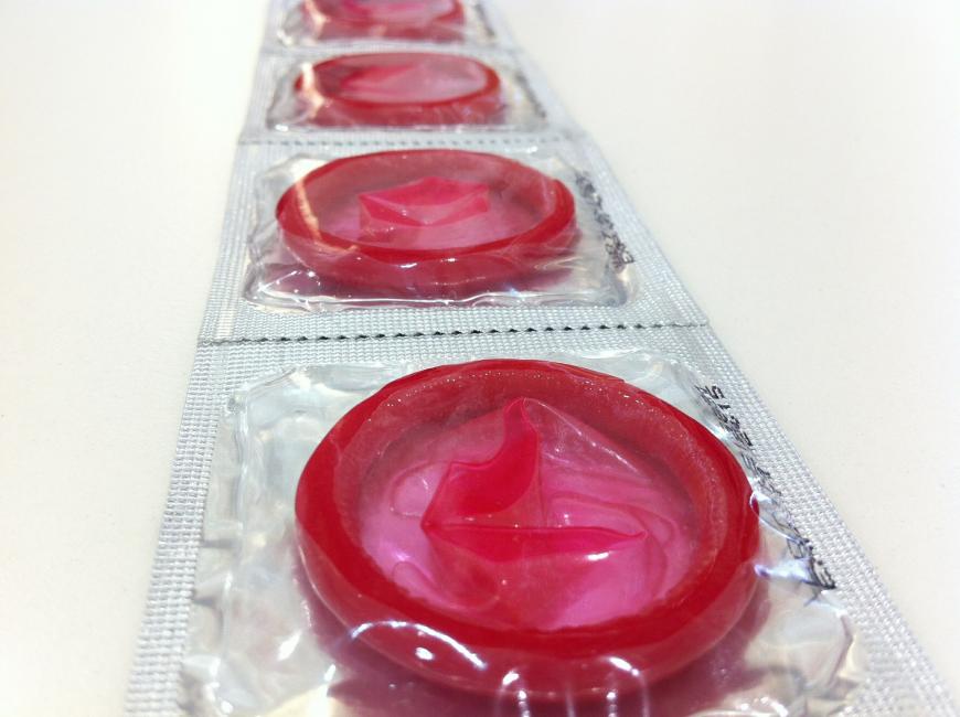 A strip of red condoms