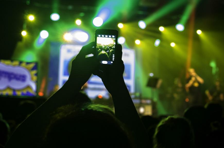 iPhone filming a concert