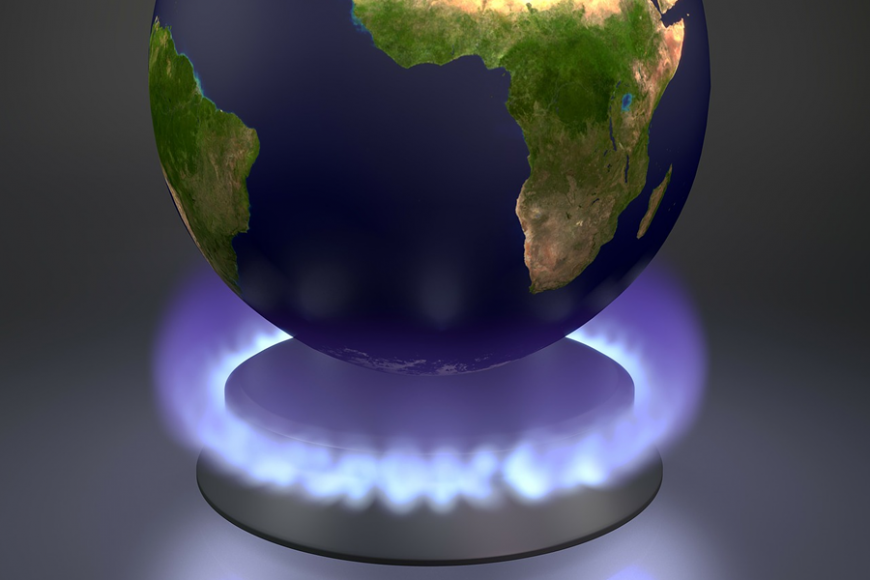 Global warming. A flame heats up Earth