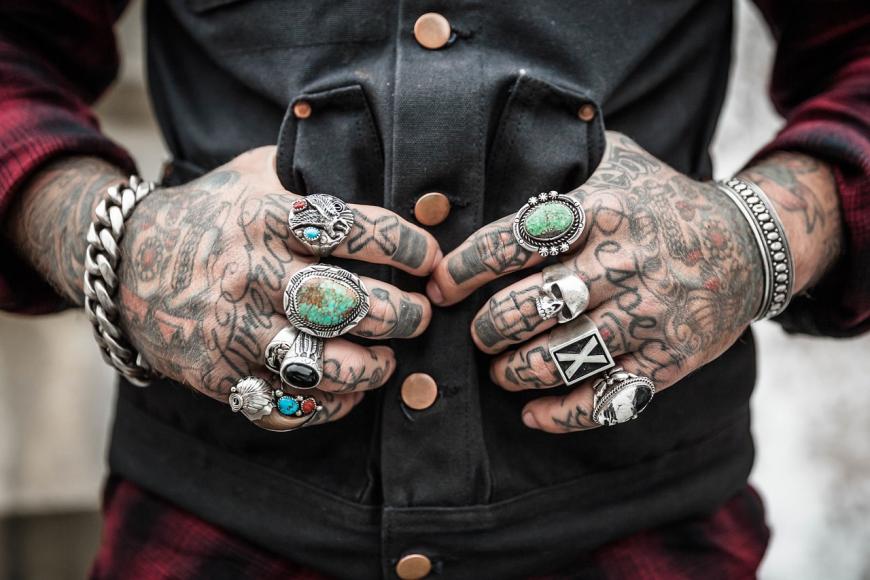 Tattooed hands of a man, rebel, bad boy