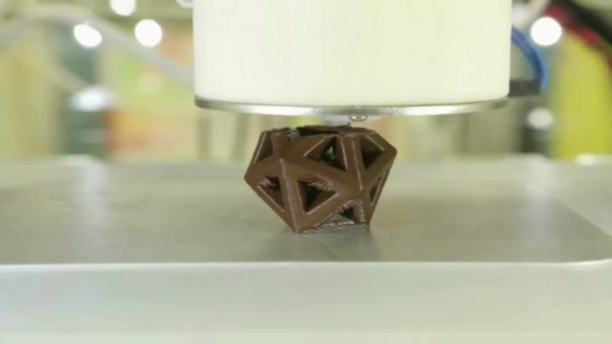 3D printing chocolate in the shape of a dodecahedron. 
