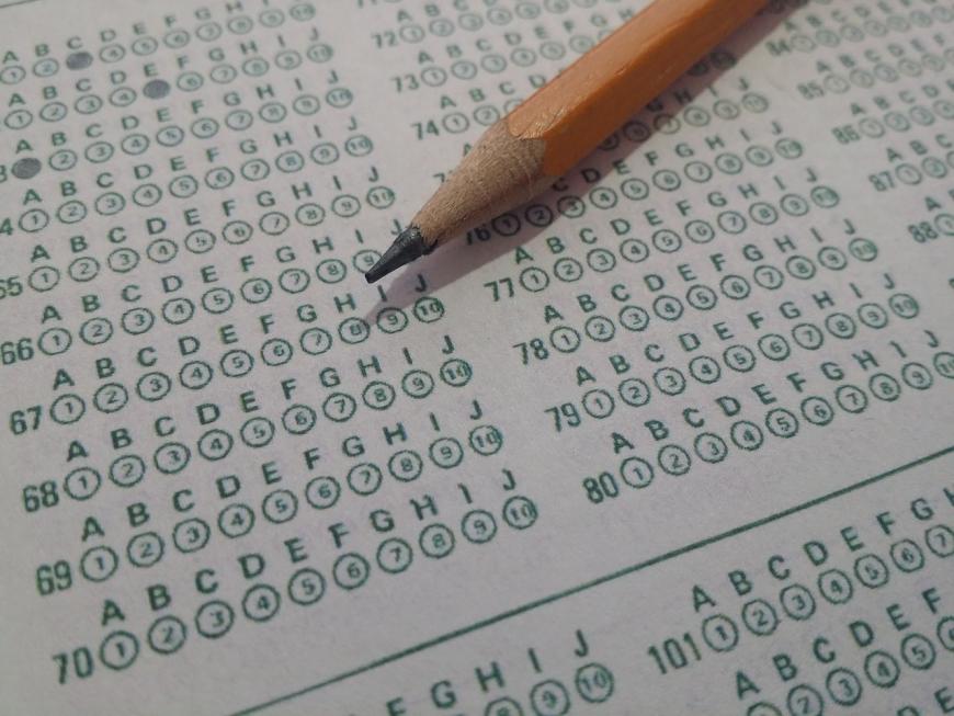 Scantron sheet with pencil.