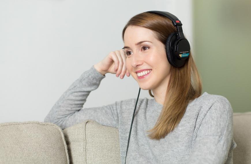 Woman listening to headphone