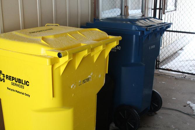 Municipal recycling bins. Yellow and blue.