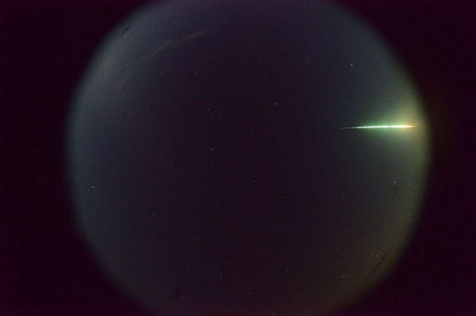 meteor seen through a telescope