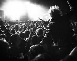 Fans at a rock concert, black and white