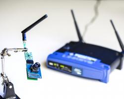 WThe UW team used ambient signals from this Wi-Fi router to power sensors in a low-resolution camera and other devices.