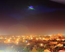 UFO above a city skyline