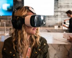 Woman using a samsung VR headset at SXSW