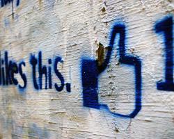 Facebook graffiti. Likes this. Thumbs Up.