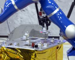 Remotely-controlled Interact Rover inserting peg