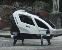 The Ehang 184, a large white drone, large enough to hold one person