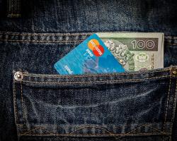 Jean pocket containing credit card and cash