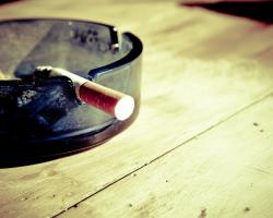Cigarette in an ash tray