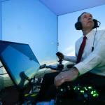 Retired US Air Force Colonel, Gene Lee, in a flight simulator